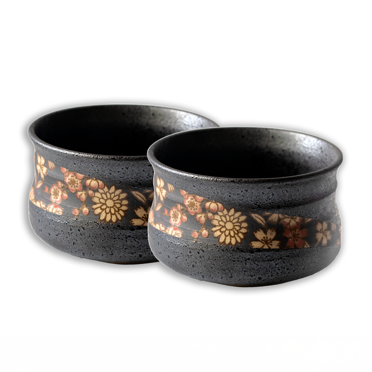 Pair of Matcha bowls, black with floral patterns on white, crafted in traditional Minoyaki style.