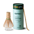 Explore the Matcha Bamboo Whisk & Holder Set, featuring a bamboo scoop and a premium matcha whisk, elegantly packaged in a sleek cylindrical design.
