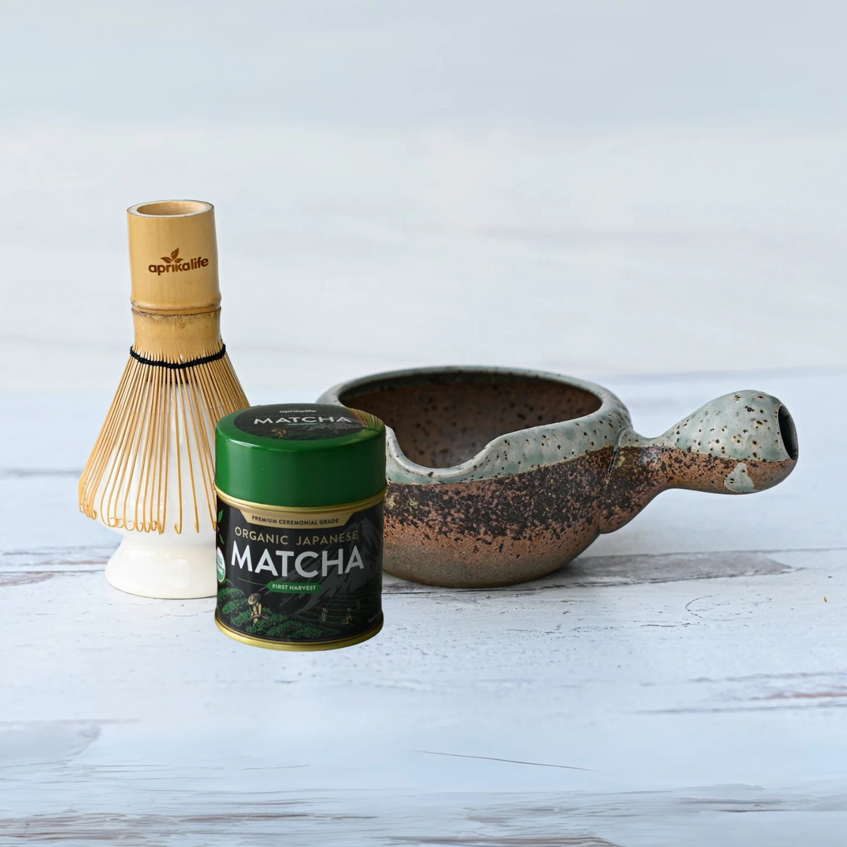 Immerse yourself in a Japanese tea ceremony with our Brown Ceramic Matcha Bowl with Spout, complete with a Bamboo Matcha Whisk, Whisk Holder, and Organic Japanese Matcha.