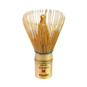 The eco-friendly Bamboo Matcha Whisk (100 Prongs) with a carved handle is perfect for traditional Japanese tea ceremonies, set against a pristine white background.