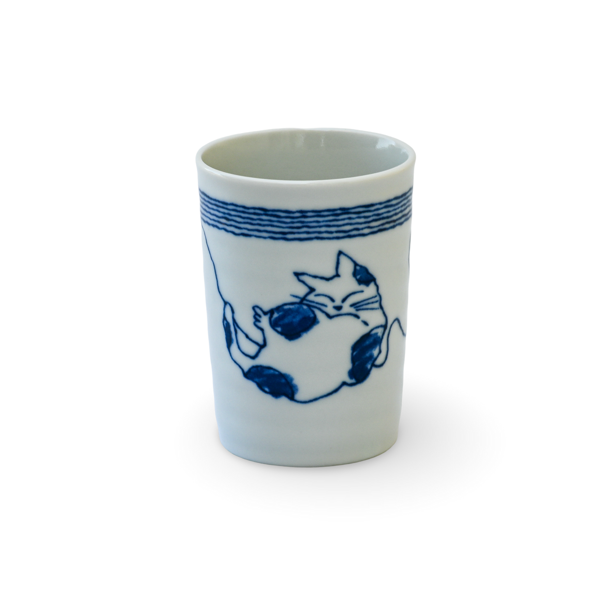 The Adorable Cat 5 Tea Cup is a blue and white Mino-ware piece, holding 180ml (6oz.), with a serene sleeping cat and blue stripes on a black background, crafted in Gifu Prefecture.