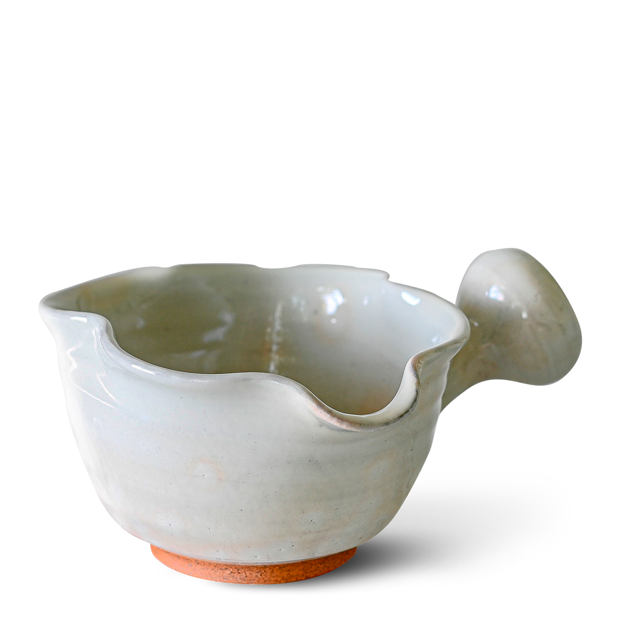 White Wavy Ceramic Matcha Bowl with spout and handle on a white background, included in a set with Bamboo Matcha Whisk, Whisk Holder, and Organic Japanese Matcha.