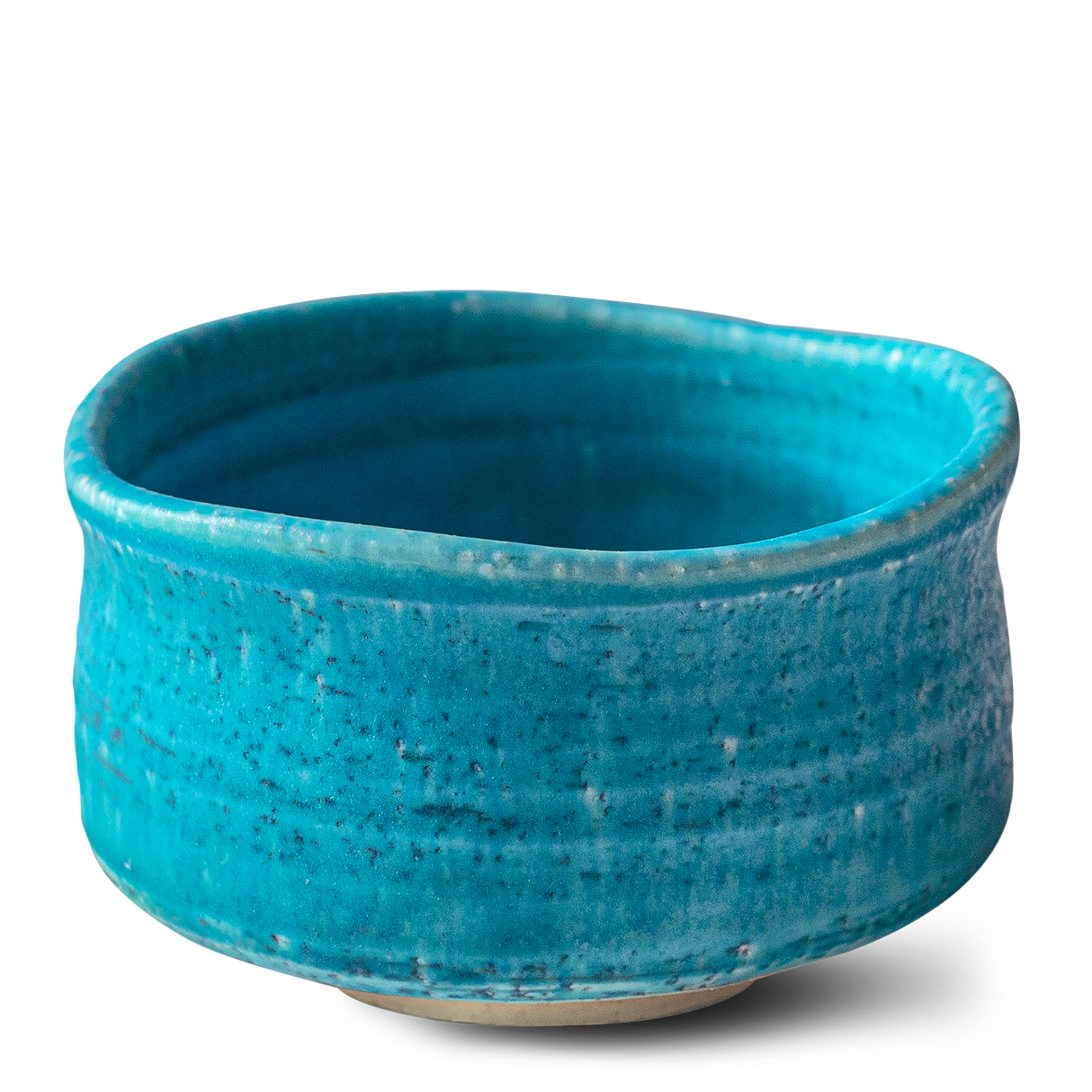 The Iguchi Blue Matcha Bowl features a textured, uneven ceramic surface that embodies the timeless artistry of Japanese pottery.