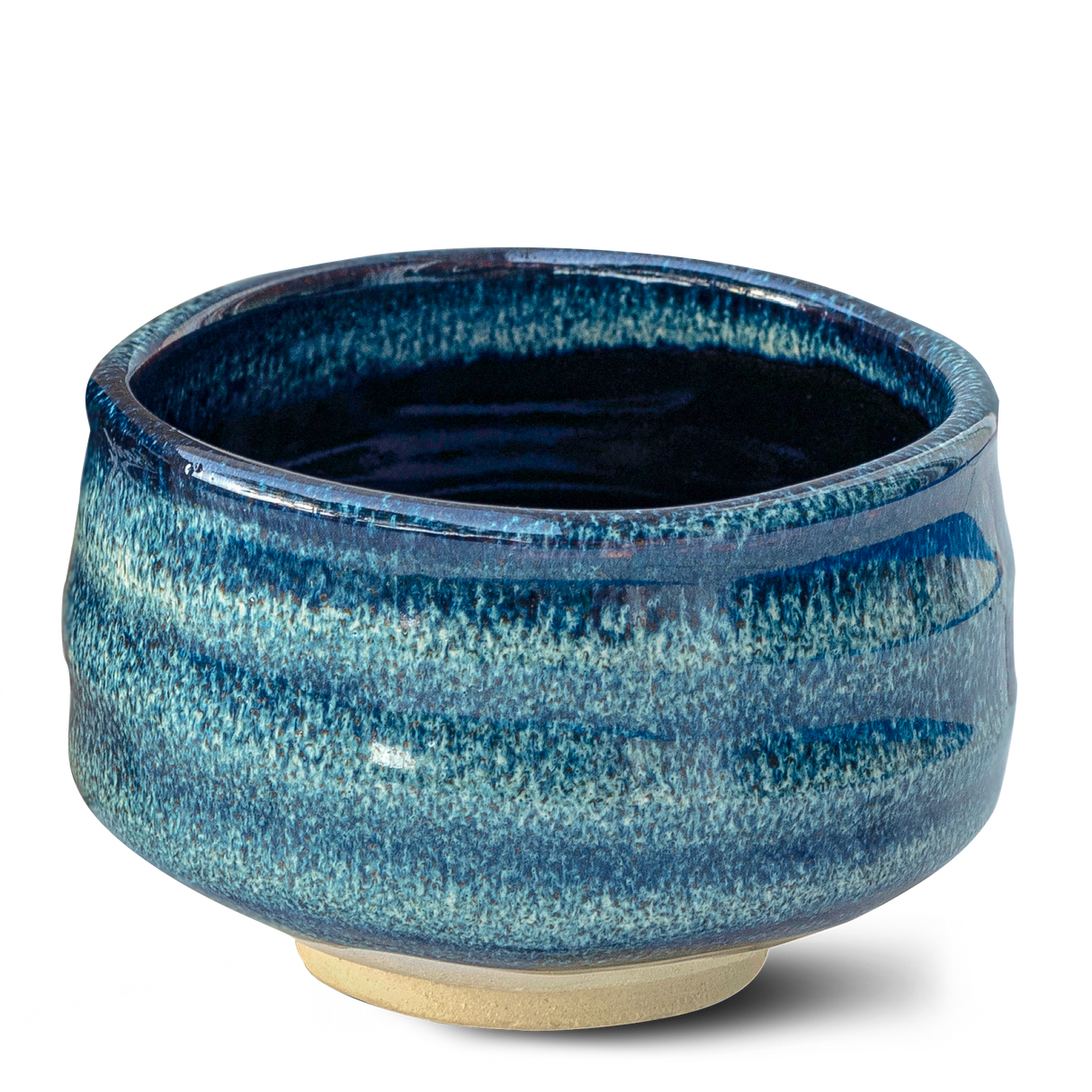 The Maruyoshi Navy Sea Ceramic Matcha Bowl features a glossy, textured finish and light base. Handcrafted in Japan, it comes with a bamboo matcha whisk, whisk holder, and organic Japanese matcha.