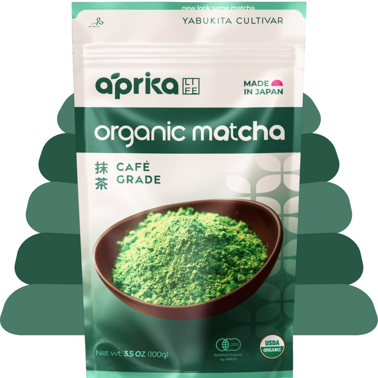 A green and white package of organic Japanese Matcha Green Tea Powder, featuring a bowl of café-grade matcha on the front.