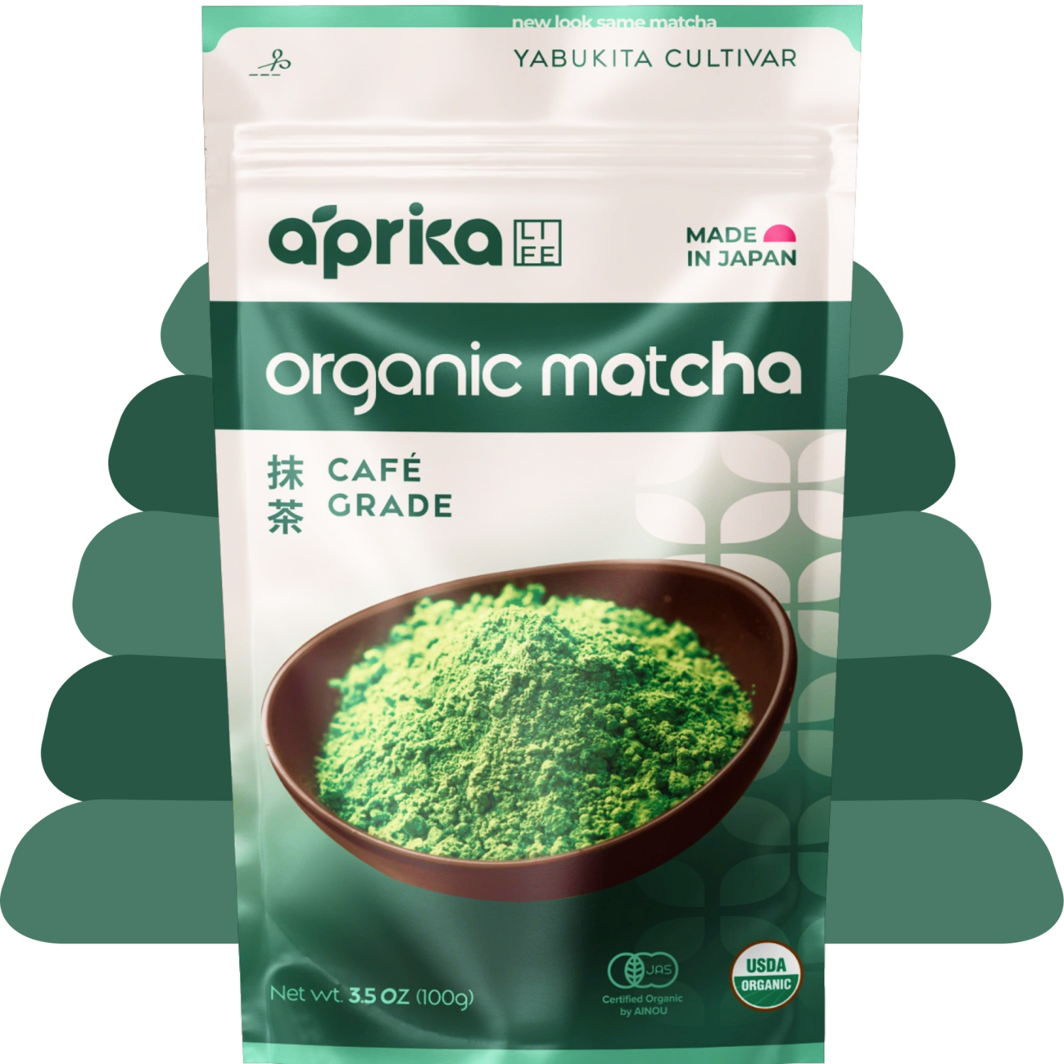 A green and white package of organic Japanese Matcha Green Tea Powder, featuring a bowl of café-grade matcha on the front.