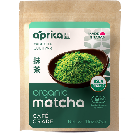 A pouch labeled "aprika" contains Organic Japanese Matcha Green Tea Powder, next to a bowl of vibrant matcha and visible certifications.