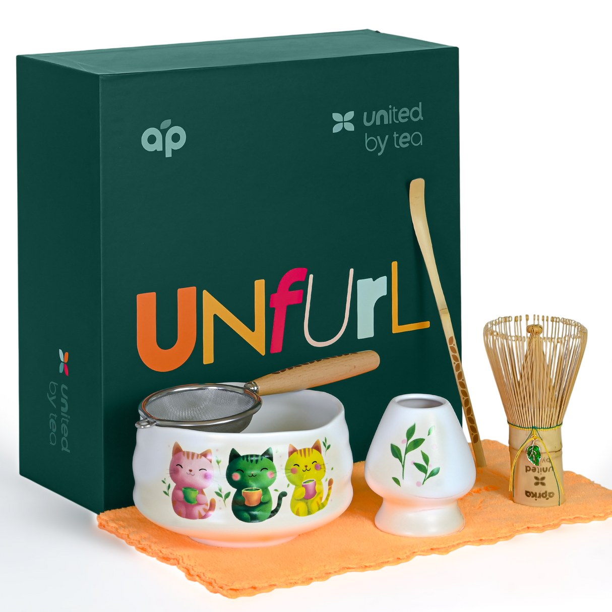 The White Unfurl Matcha Gift Set includes a kawaii cat bowl, bamboo whisk, strainer, scoop, and a green "United by Tea" box—making it a purrfect gift for tea lovers.