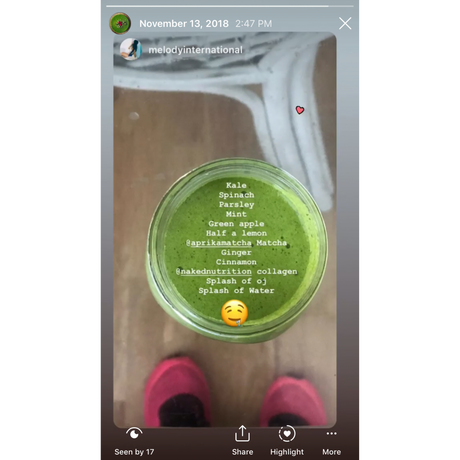 An overhead view shows a smoothie made with Organic Japanese Matcha Green Tea Powder, surrounded by its ingredients, and feet in pink shoes visible at the bottom.
