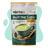 A package of Ceremonial Grade Matcha Latte Powder Mix with Natural Vanilla Flavor, featuring a vibrant green latte in a ceramic cup on the front.