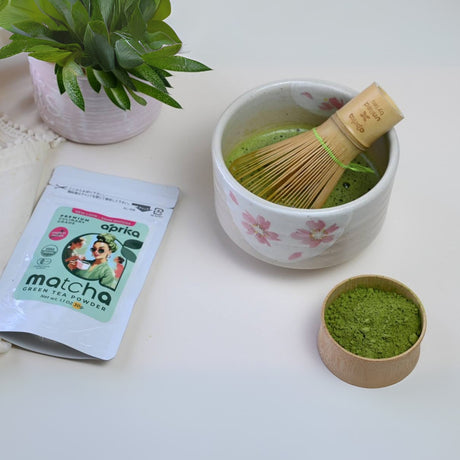 Enhance your matcha ritual with the Beige with Pink Flowers Matcha Bowl, Bamboo Whisk, Whisk Holder, and Organic Japanese Matcha Set—an elegant addition to any matcha accessory collection.