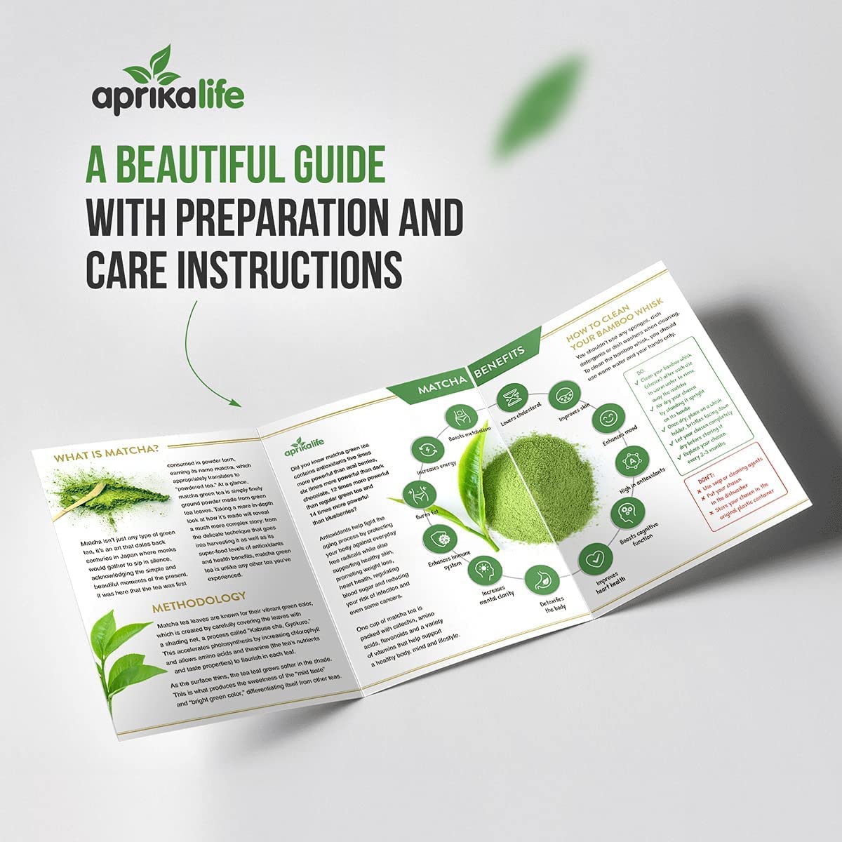 A brochure for the Black Matcha Tea Gift Set includes preparation instructions for ceremonial matcha tea, adorned with text, green graphics, and the AprikaLife logo, plus tips on using a bamboo whisk for an ideal blend.